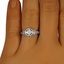 The Xolani Ring, smallzoomed in top view on a hand