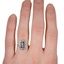 The Naida Ring, smallzoomed in top view on a hand