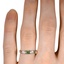 The Kilenya Ring, smallzoomed in top view on a hand