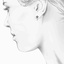 The Rainn Earrings, smalltop view on a hand