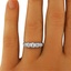 The Mildred Ring, smalltop view on a hand