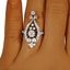 The Twyla Ring, smallzoomed in top view on a hand