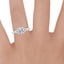 Platinum Reverie Solitaire Ring, smallzoomed in top view on a hand