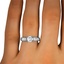The Liora Engagement Ring, smallzoomed in top view on a hand