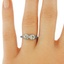 The Duet Ring, smallzoomed in top view on a hand