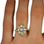 The Roza Ring, smallzoomed in top view on a hand