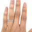 The Ettie Ring, smallzoomed in top view on a hand