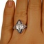 The Aradia Ring, smallzoomed in top view on a hand