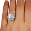 The Lumina Ring, smallzoomed in top view on a hand