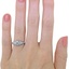 The Hallie Ring, smallzoomed in top view on a hand