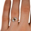 The Takoda Ring, smallzoomed in top view on a hand