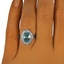The Genista Ring, smalltop view on a hand
