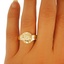 The Osira Ring, smalltop view on a hand