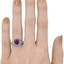 The Ozie Ring, smallzoomed in top view on a hand