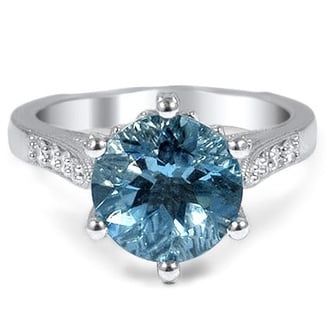 Custom Embellished Aquamarine Ring with Decorative Crown