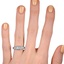 The Caprina Ring, smallzoomed in top view on a hand