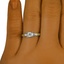The Calida Ring, smallzoomed in top view on a hand