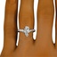 The Lilia Ring, smallzoomed in top view on a hand
