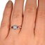 The Palila Ring, smallzoomed in top view on a hand