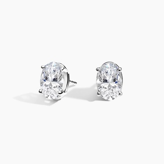 Four-Prong Oval Diamond Stud Earrings in 18K White Gold