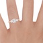14K Rose Gold Luxe Trillion Cut Three Stone Diamond Ring, smallzoomed in top view on a hand