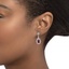 The Ashley Earrings, smalltop view on a hand
