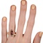 The Pearlina Ring, smallzoomed in top view on a hand