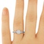 The April Ring, smalltop view on a hand
