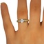 The Candia Ring, smallzoomed in top view on a hand