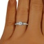 The Amina Ring, smallzoomed in top view on a hand