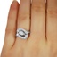 The Pahana Ring, smallzoomed in top view on a hand