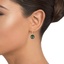 The Campos Earrings, smalltop view on a hand