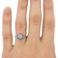 The Lorita Ring, smallzoomed in top view on a hand