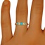 The Demaris Ring, smalltop view on a hand