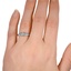 The Caitrin Ring, smallzoomed in top view on a hand