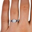 The Noel Ring, smallzoomed in top view on a hand