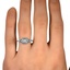 The Charulata Ring, smallzoomed in top view on a hand
