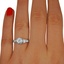 The Maysie Ring, smallzoomed in top view on a hand