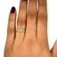 The Caledonia Ring, smallzoomed in top view on a hand