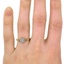 The Flor Ring, smallzoomed in top view on a hand