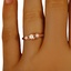 The Idonia Ring, smallzoomed in top view on a hand