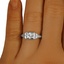 The Lyndi Ring, smallzoomed in top view on a hand