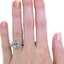 The Patria Ring, smallzoomed in top view on a hand