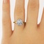 The Naia Ring, smalltop view on a hand