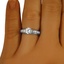 The Tamia Ring, smallzoomed in top view on a hand