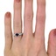 The Rheba Ring, smallzoomed in top view on a hand