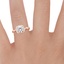 14K Rose Gold Petite Twisted Vine Halo Diamond Ring (1/4 ct. tw.), smallzoomed in top view on a hand