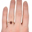 The Emalia Ring, smallzoomed in top view on a hand