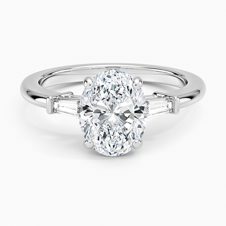18K White Gold Symphony Tapered Baguette Three Stone Diamond Ring (1/5 ct. tw.)