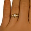 The Aideen Ring, smallzoomed in top view on a hand